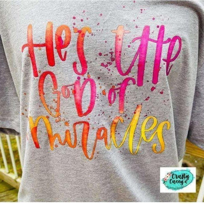 Crafty Casey's Apparel>Woman's>Activewear>Unisex>T-Shirts S / Athletic Heather / Short Sleeve He's The God Of Miracles Retro-Tie Die-Unisex T-shirt