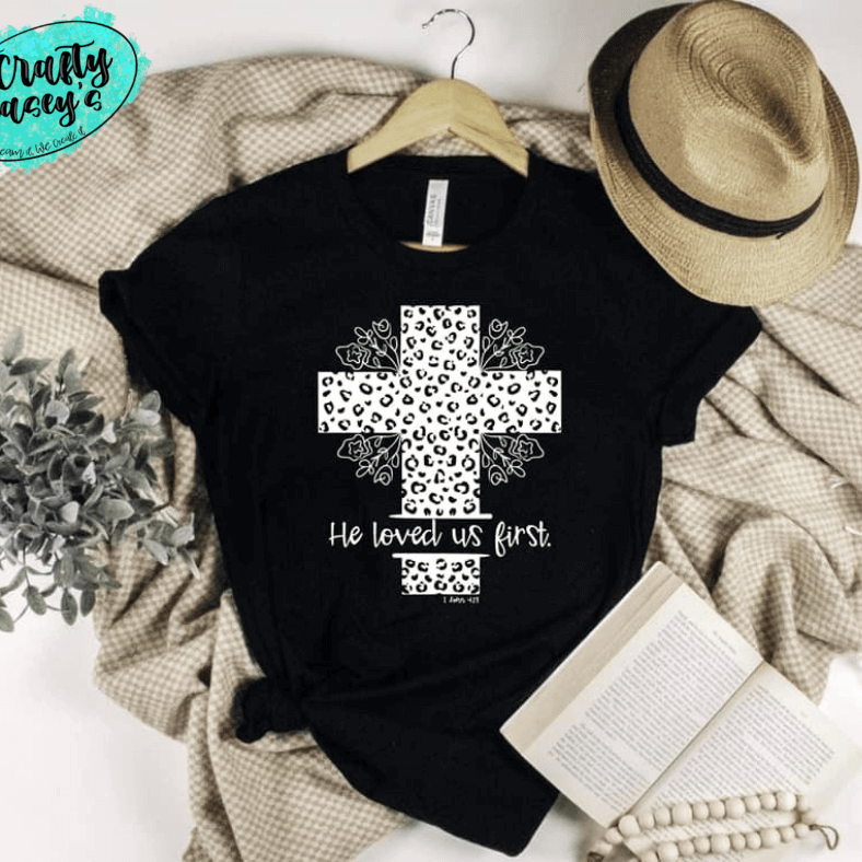 He Loved Us First White Cheetah Cross Easter Spiritual Tee