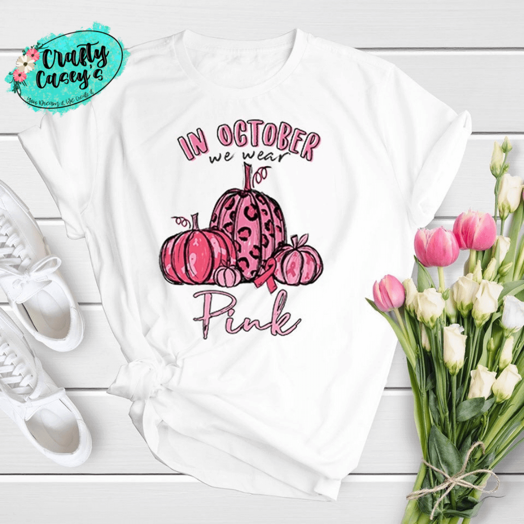 Crafty Casey's Awareness Unisex T-shirts S / White / Short Sleeve In October We Wear Pink-Pumpkin Breast Cancer Awareness- Unisex- T-shirts