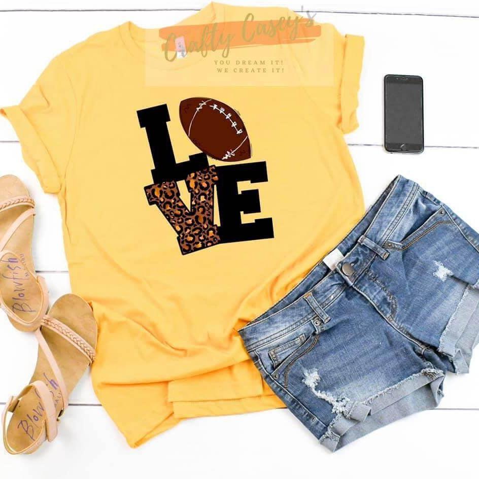 Crafty Casey's Sports Unisex T-shirts S / Yellow / Short Sleeve Love Football - Unisex  T-shirt.