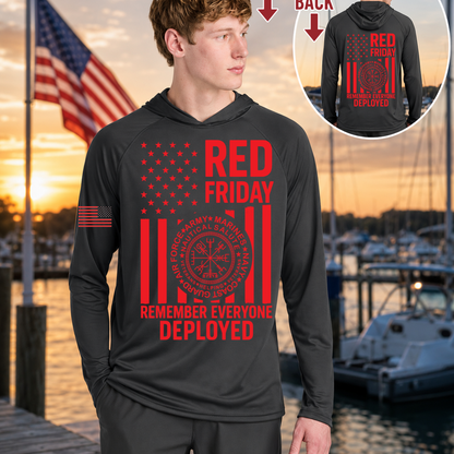 Person wearing a black hoodie with 'Red Friday' and 'Remember Everyone Deployed' text, with a marina and American flag in the background.