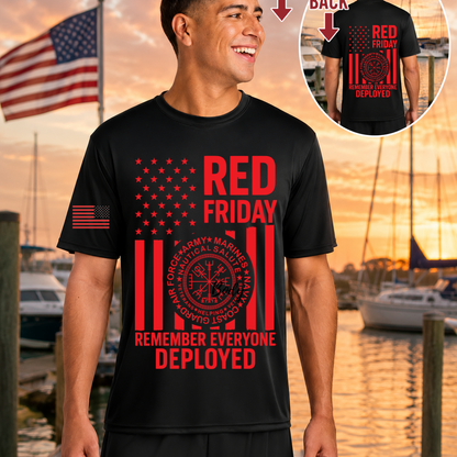 Man wearing a black t-shirt with 'Red Friday' and 'Remember Everyone Deployed' text at a dock.