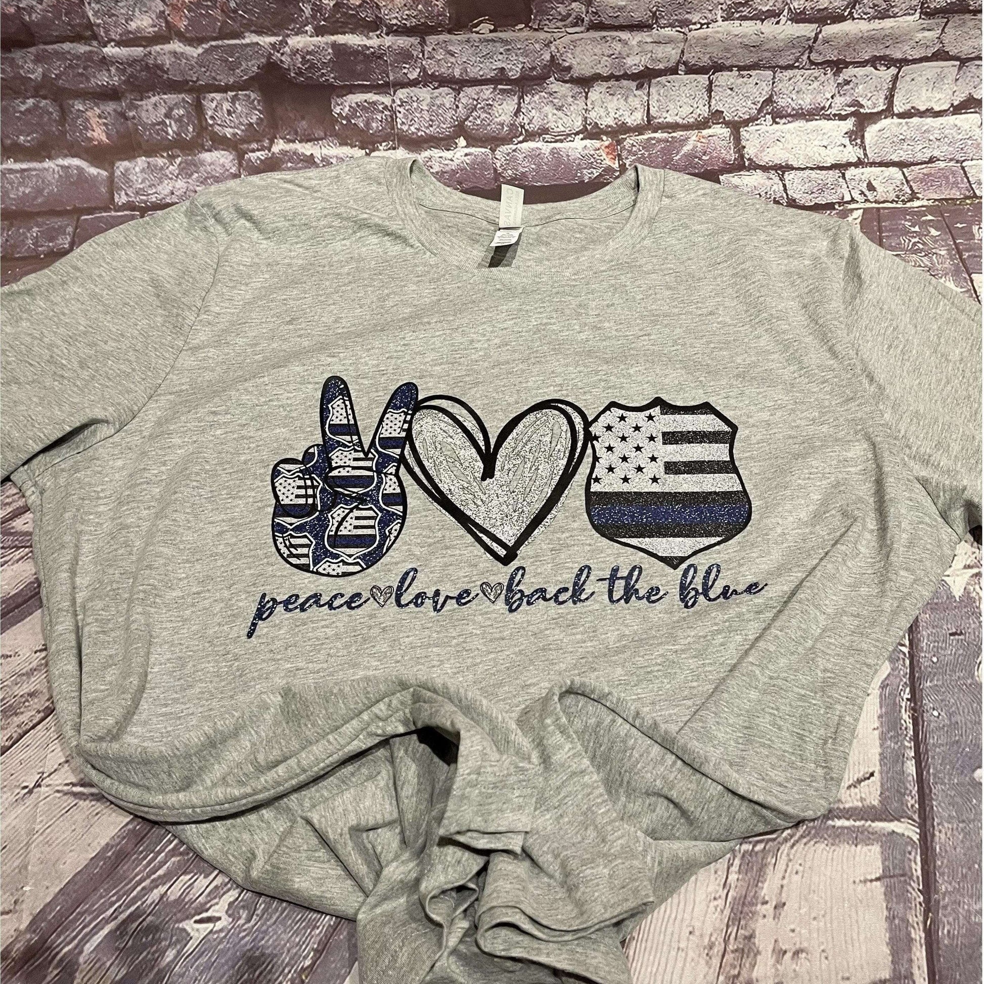 Crafty Casey's Awareness Unisex T-shirts Peace Love & Back The Blue Line- Unisex  T-shirts