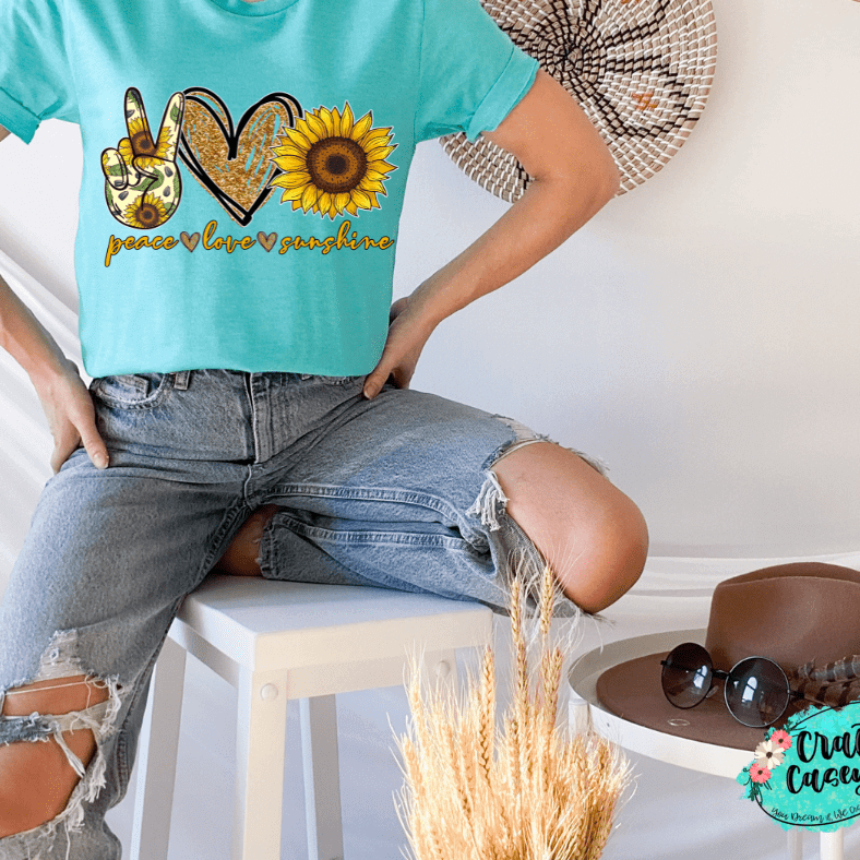 Peace Love Sunflower Graphic Shirt inspirational motivational spiritual graphic shirt by Crafty Casey’s