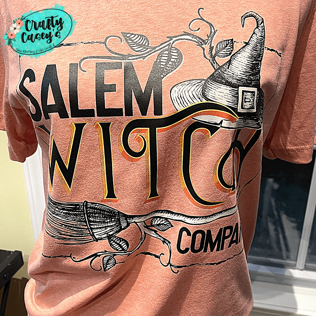 Crafty Casey's Halloween Unisex T-shirts S / Heather Peach / Short Sleeve Salem Witch Company - Women's Halloween  Bella Canvas Unisex  T-shirts