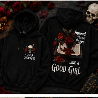 Two black hoodies with skull and rose designs on a dark background with flowers and a skull.