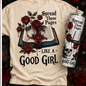 Collage of Gothic-themed merchandise including t-shirts, hoodies, tumblers, and a tumbler bundle with text 'Spread Those Pages Like a Good Girl'.